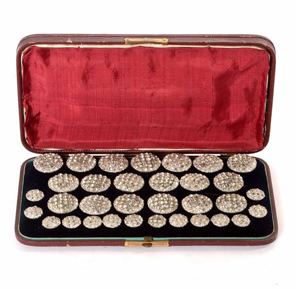 Set di bottoni da livrea in metallo e pietre semipreziose, XIX secolo
