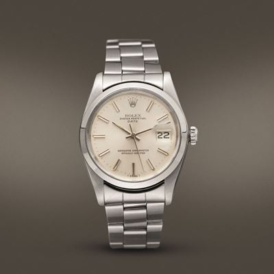 Rolex - Oyster Perpetual Date Ref 1500 in Acciaio con Ghiera Liscia, Vetro Plastica, Automatico.