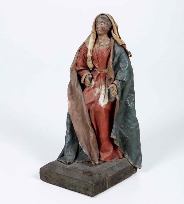Figura da presepe in cartapesta. Madonna. Italia XVIII-XIX secolo