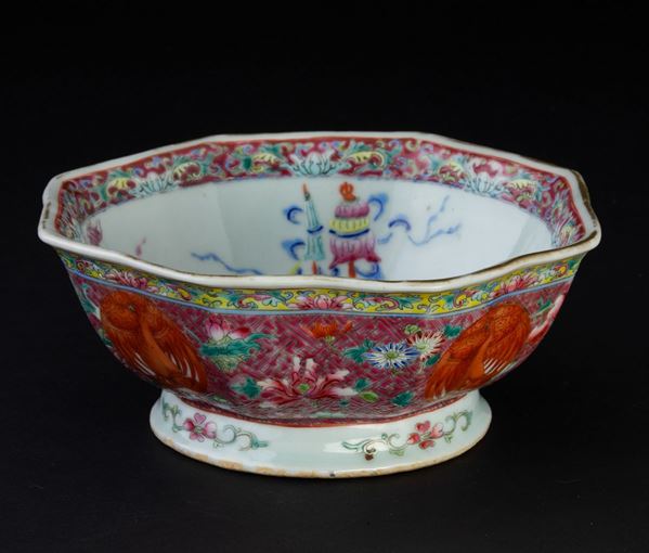 A porcelain bowl, China, Qing Dynasty, 1800s Apocryphal Qianlong mark. Polychrome enamels.