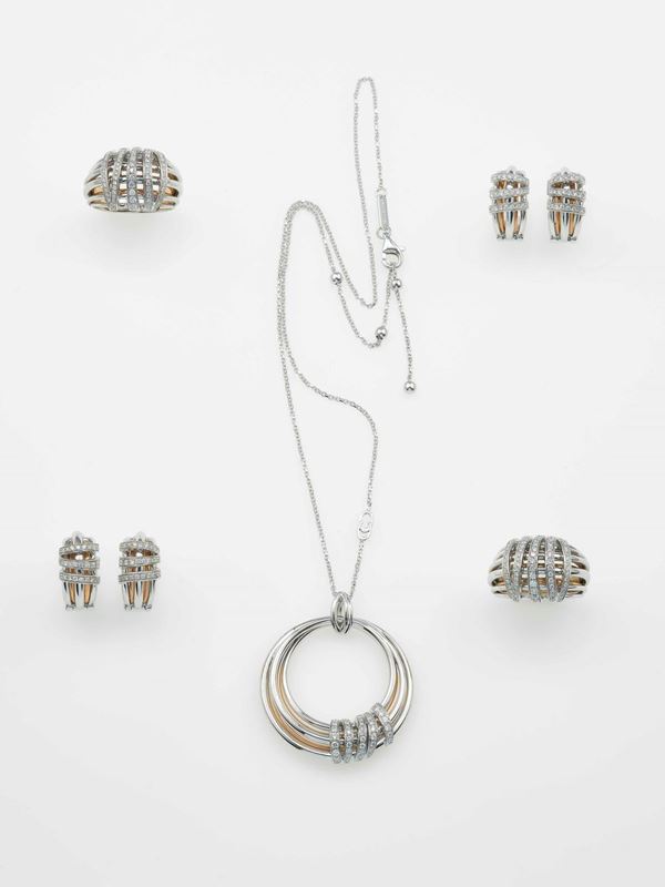 Modello Vita. Lotto composto da due paia di orecchini, due anelli ed un pendente con diamanti