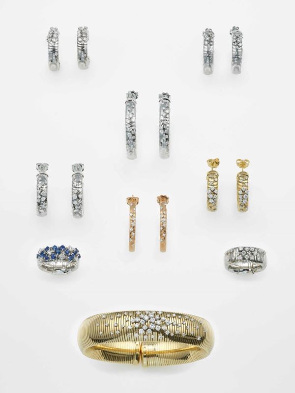 Group of six pairs of earrings, two rings and one bangle bracelet