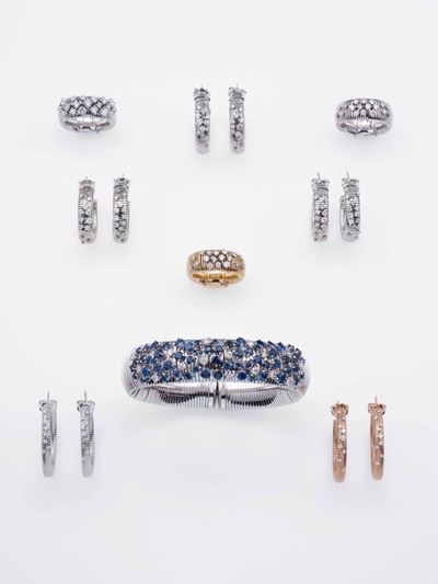Modello Stardust. Lotto Composto da Tre Anelli, Cinque Paia di Orecchini ed un Bracciale con Diam...