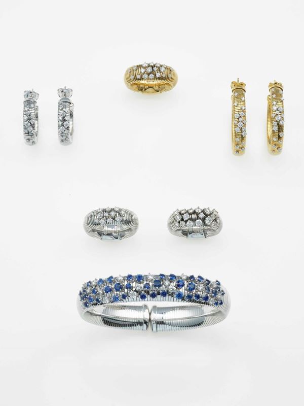 Group of four pairs of earrings, three rings and one bangle bracelet