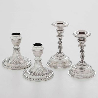 Due Coppie di Candelieri. Argento Fuso, Sbalzato e Cesellato. Epoche e Manifatture Inglesi Differ...
