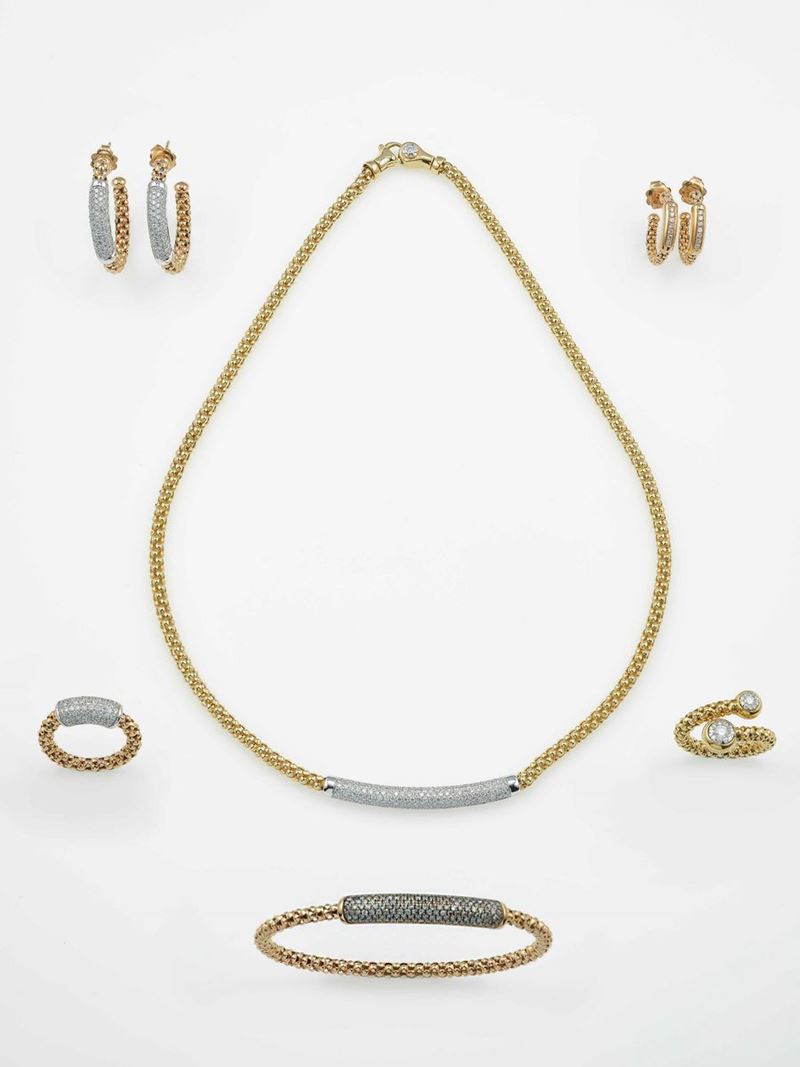 Group of two pairs of earrings, two rings, one necklace and a bangle bracelet  - Auction Contemporary Jewels - Cambi Casa d'Aste