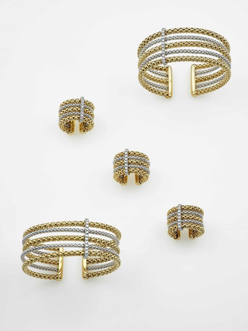 Modello Stretch Multiple. Lotto composto da due bracciali e tre anelli con diamanti  - Asta Gioielli Contemporanei - Cambi Casa d'Aste