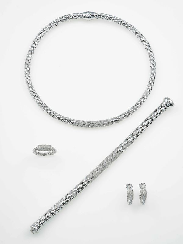 Modelli Stretch Diamonds e Stretch Classic. Lotto composto da un girocollo, un anello, un bracciale ed un paio di orecchini con diamanti