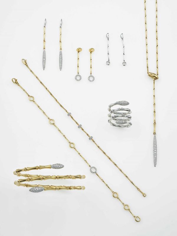 Group of three pairs of earrings, three bracelets, one bangle bracelet, one ring and one necklace