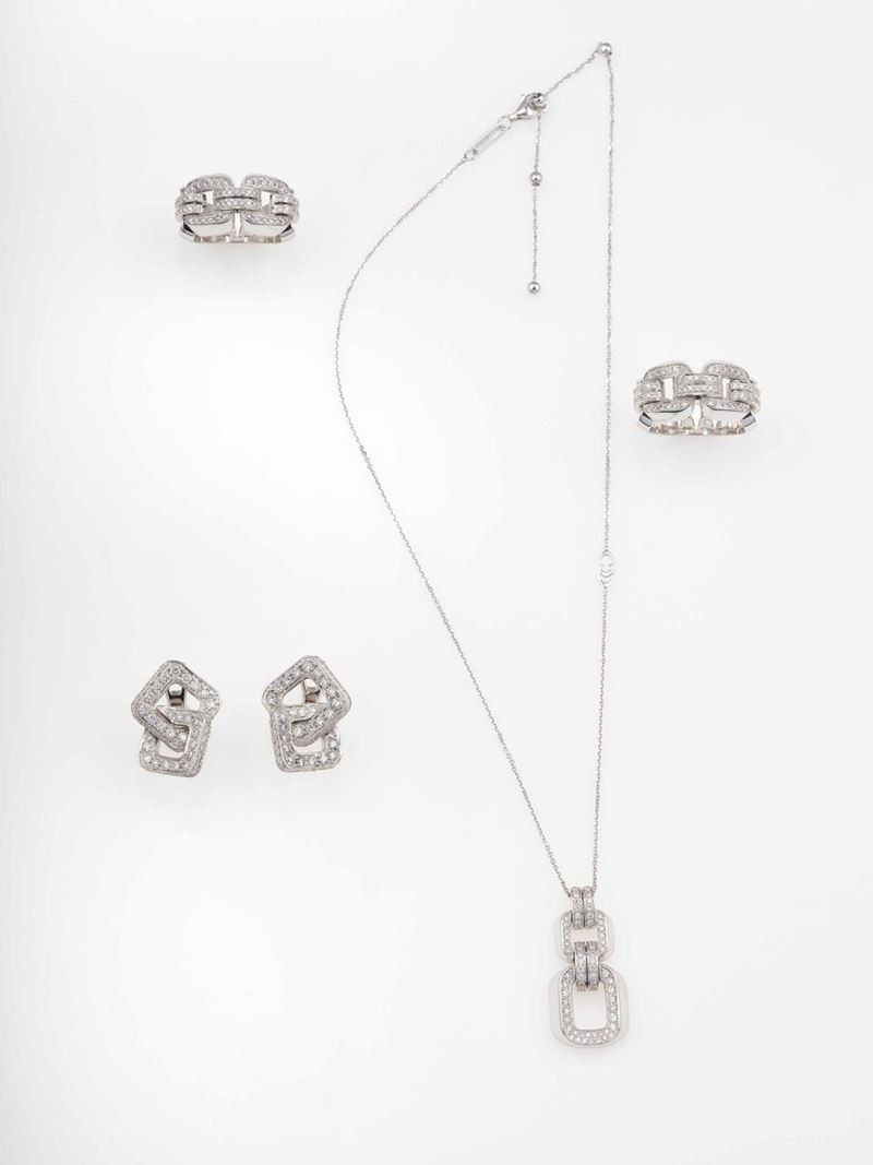 Group of two rings, one pair of earrings and one pendent  - Auction Contemporary Jewels - An Italian brand story - Cambi Casa d'Aste