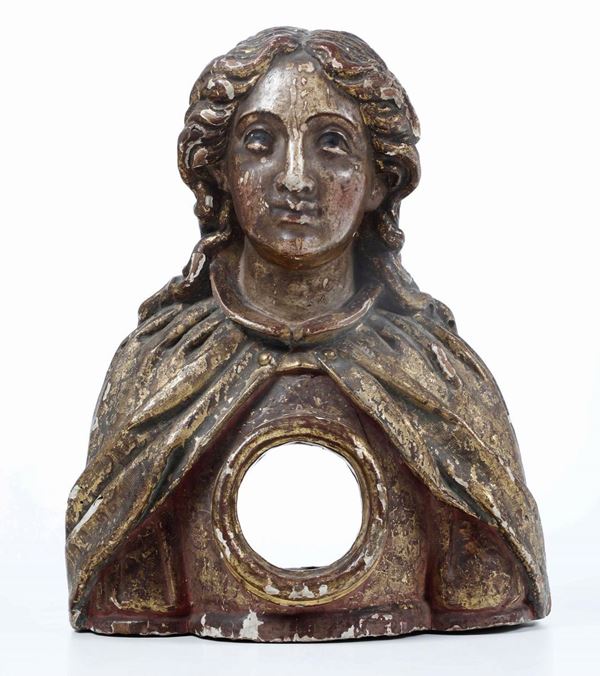 Busto reliquiario. Legno scolpito e dorato. Arte del XVIII secolo