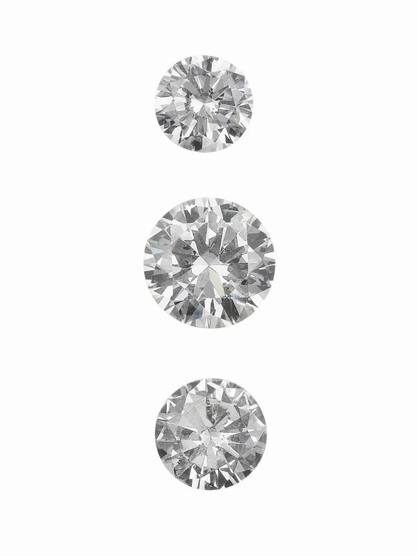 Three unmounted brilliant-cut diamonds