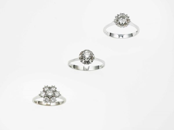 Three brilliant-cut diamond rings