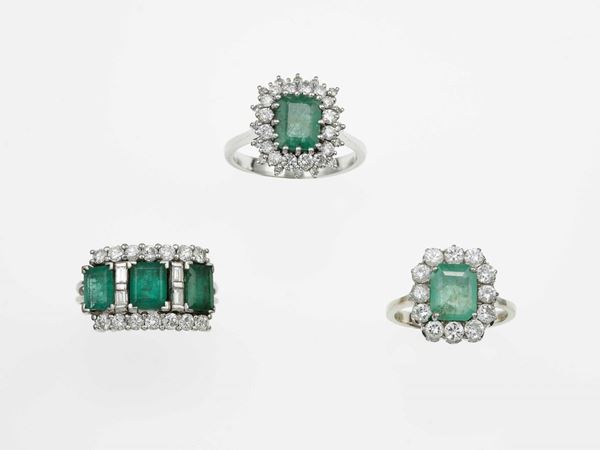 Group of three emerald and diamond rings