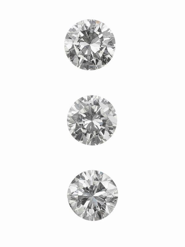 Three unmounted brilliant-cut diamonds