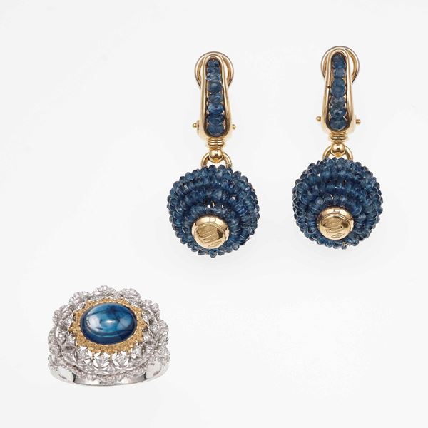Sapphire and gold ring and a pair of earrings