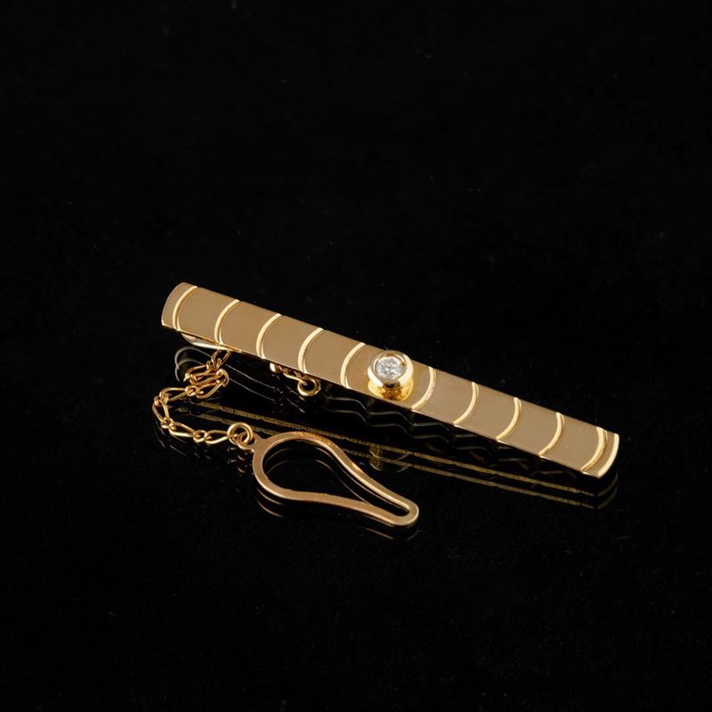 Ferma cravatte in oro con un brillante  - Asta For Men | Cambi Time - Cambi Casa d'Aste