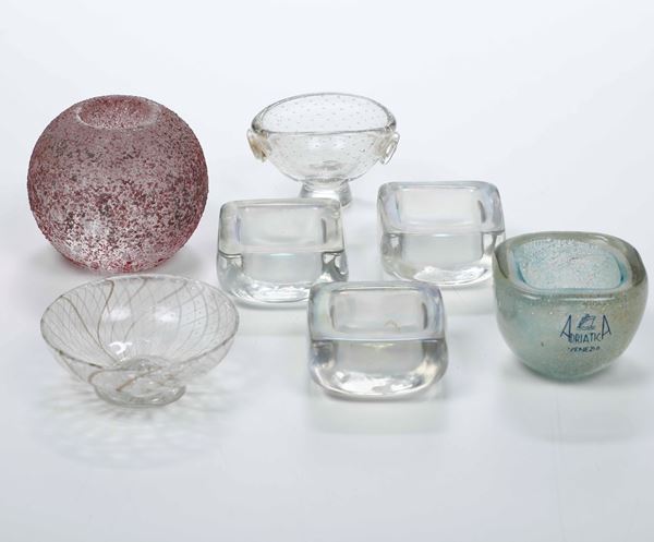 Collezione di sette posacenere in vetro di Murano. XX secolo