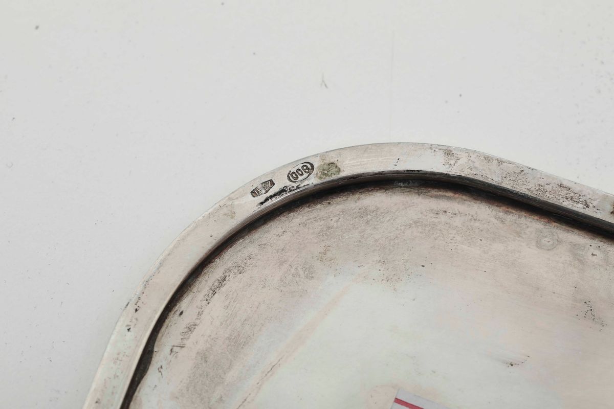 Insieme di Nove Sottopiatti. Argento Fuso e Sagomato. Argenteria Italiana del XX Secolo. Argentie...