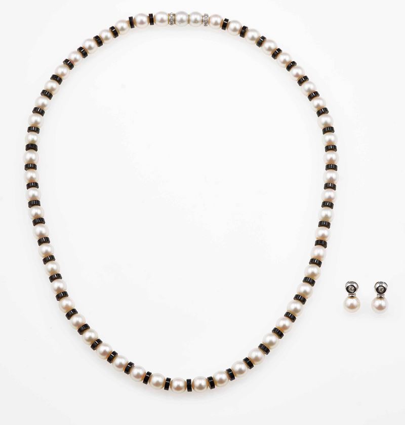 Lotto composto da collana di perle con onice ed una paio di orecchini di perle con diamanti  - Asta Gioielli - Cambi Casa d'Aste