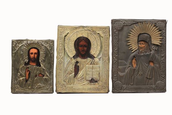 Tre icone. Riza in metallo argentato e dorato. Scuola russa del XIX-XX secolo Cristo Pantocratore e San Demetrio di Rostov