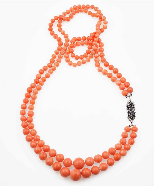 Coral necklace with gold, diamond and sapphire clasp