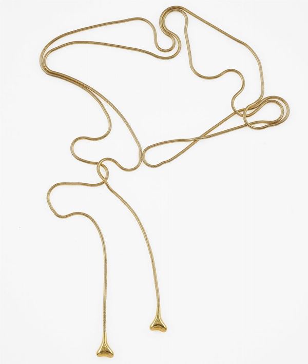 Long chain necklace with bone motif terminals. Signed Tiffany & Co.