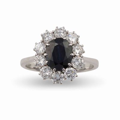 Anello con Zaffiro Australia di Ct 1.50 Circa e Diamanti Taglio Brillante per Ct 1.00 Circa