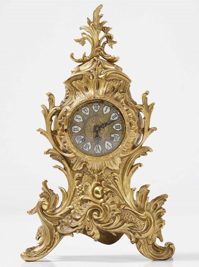 Orologio da appoggio in bronzo dorato, XIX-XX secolo  - Auction Antique June | Cambi Time - Cambi Casa d'Aste