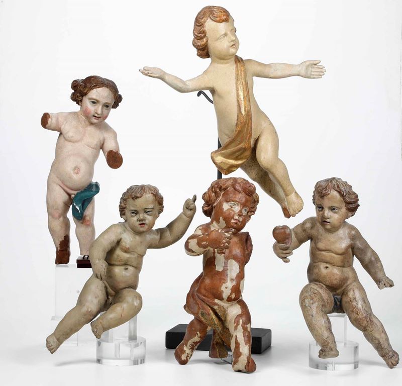 Cinque putti diversi in legno scolpito. Varie epoche e manifatture  - Auction Sculptures | Cambi Time - Cambi Casa d'Aste