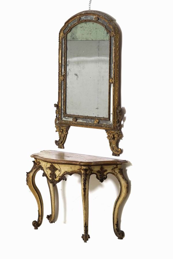 Consolle con specchiera in legno intagliato e laccato. XIX secolo