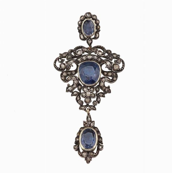 Sapphire, diamond, low karat gold and silver pendant