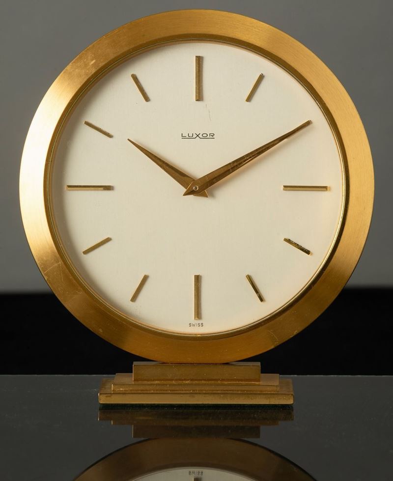 LUXOR - Pendolatta da tavolo in ottone dorato, carica manuale  - Auction For Men | Cambi Time - Cambi Casa d'Aste