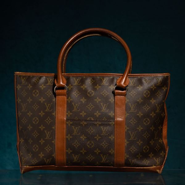 Lot 63 - Louis Vuitton - Alzer monogram suitcase