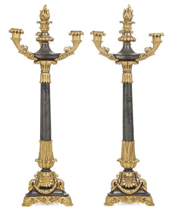 Coppia di candelabri in bronzo patinato e dorato, XIX secolo