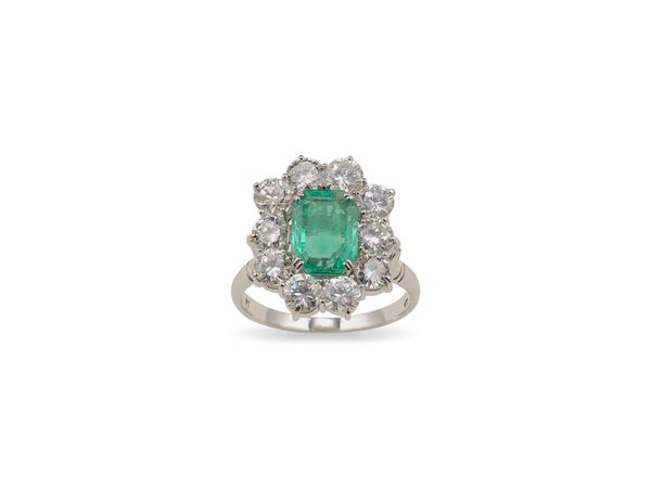 Emerald, diamond and platinum cluster ring