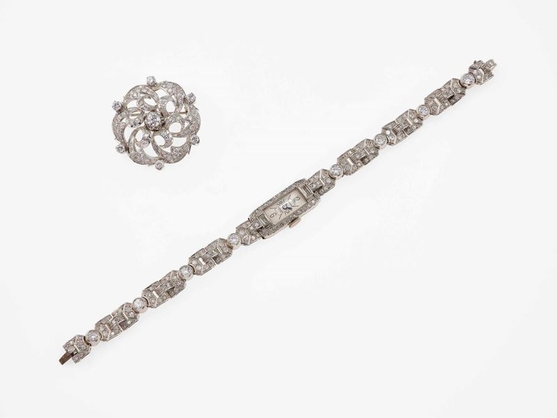 Diamond, platinum and gold lady's wristwatch and brooch  - Auction Fine and Coral Jewels - Cambi Casa d'Aste
