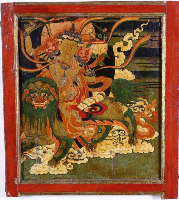 Pannello in legno dipinto raffigurante Guanyin assisa su drago. India-Tibet, XIX secolo