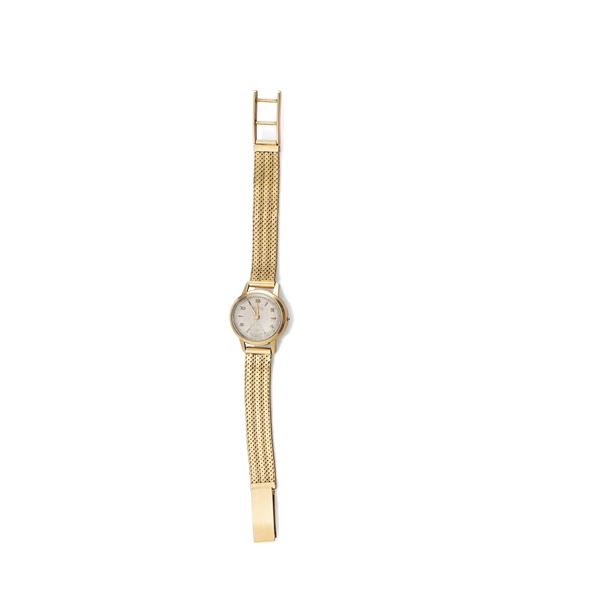 Elegant and refined 18k yellow gold women's watch with applied silver-coloured dial, hand winding