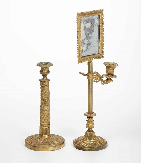 Lotto di due candelieri, uno con litofania in bronzo dorato, epoca Carlo X