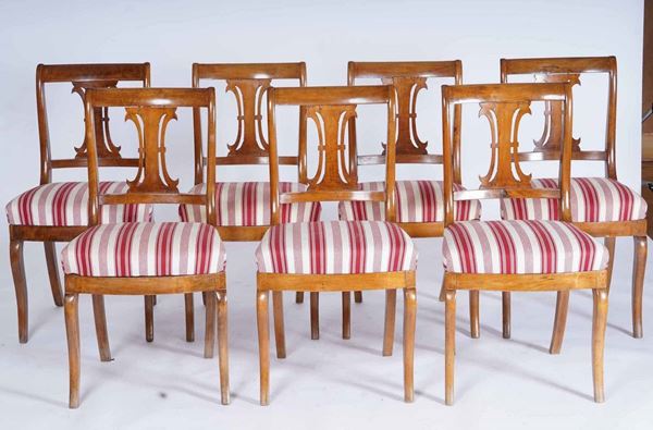 Sette sedie in ciliegio. XIX secolo