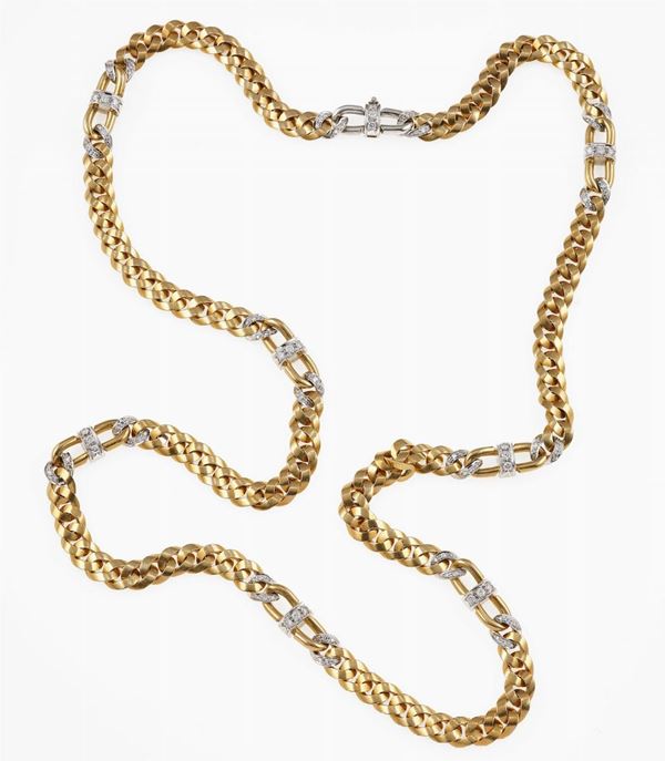 Gold and diamond chain. Signed Pomellato
