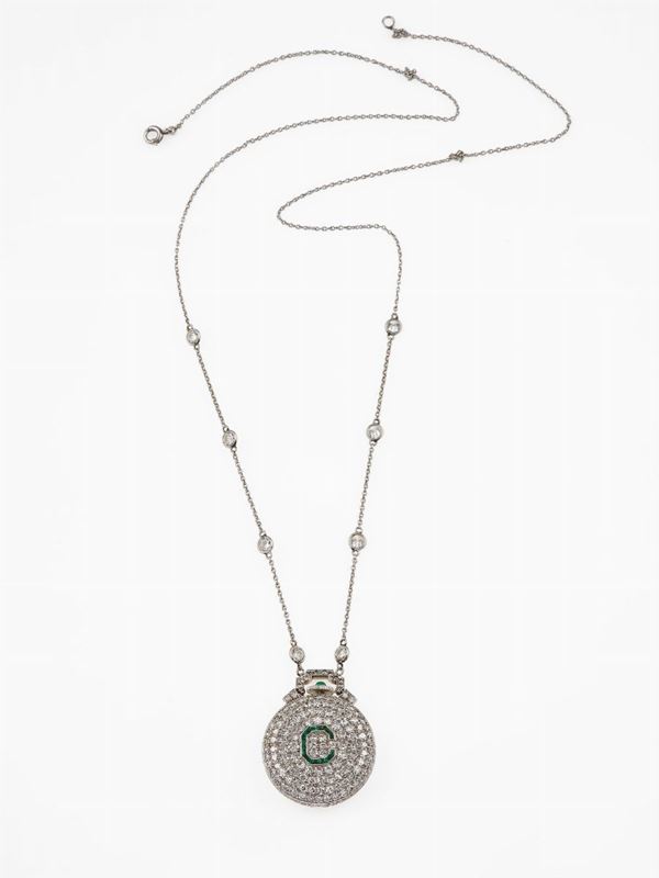 Diamond, emerald and platinum necklace/watch
