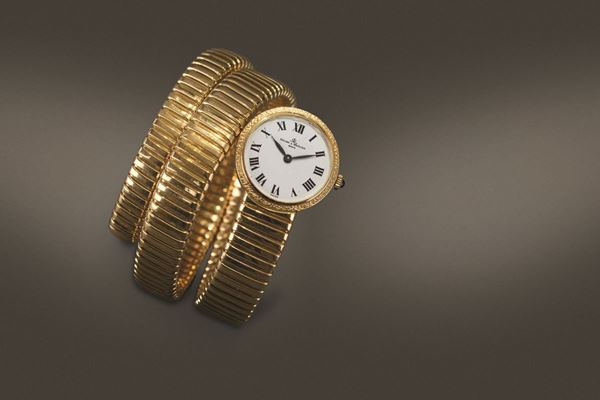 BAUME & MERCIER - Tubogas orologio da donna in oro 18k al quarzo con bracciale integrato, quadrante bianco con numeri Romani