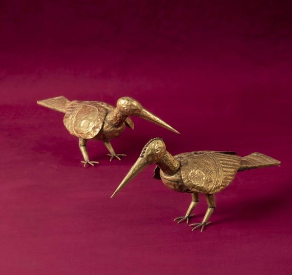 Two gilded metal foil birds. Latin America, 19th century