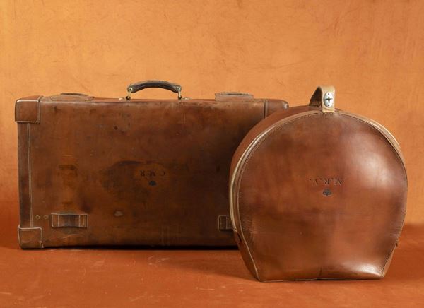 Three suitcases and a hatbox
