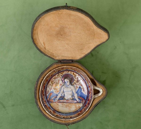 A terracotta mug, Gubbio, early 16th century