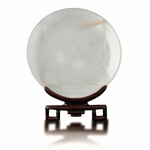 Carved white jade plate with engraved symmetrical decorations, China, Qing Dynasty, 19th century
