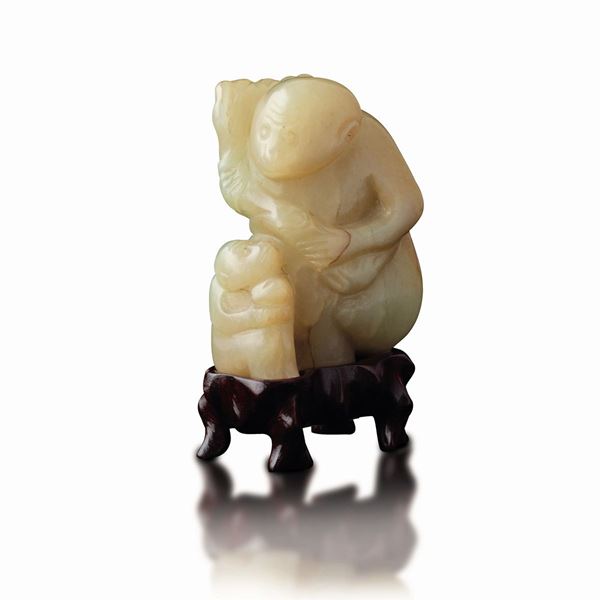 Small group with children carved in yellow jade, China, Qing Dynasty, Qianlong period (1736-1796)
