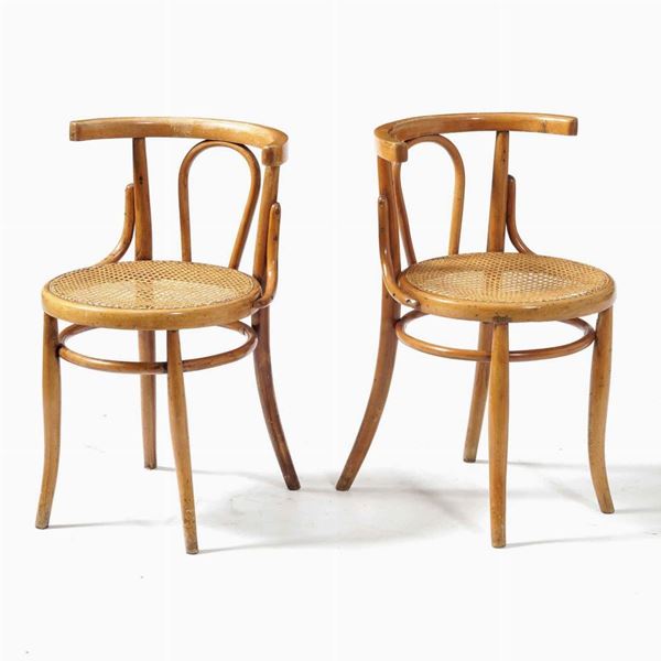 Coppia di sedie in legno curvato e seduta in cannetè